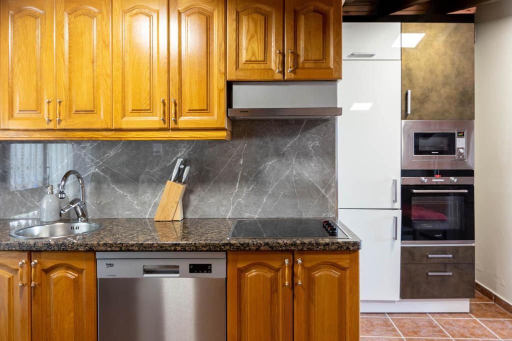 Apartamentos El Coritu Nieda Exteriör bild